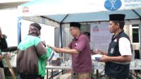 Ojol Food Stop Ramadhan Bagikan Ratusan Paket Berbuka di Jakarta Pusat