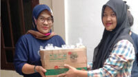 Aksi Nyata, Lajnah Imaillah Ciherang Bagikan Makanan Tambahan bagi Balita di Posyandu