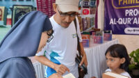 Pameran Al-Quran 100 Bahasa, Jemaat Ahmadiyah Banjarmasin Raih Predikat Stan Terfavorit